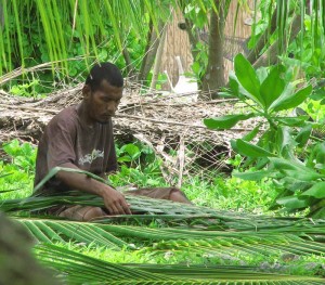 Coconut frond weaving for roof coverage